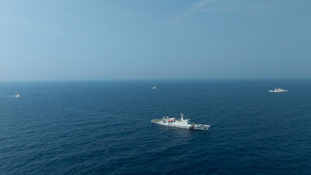 4月22日，中越海警艦艇編隊(duì)在北部灣海域開展聯(lián)合巡邏。（中國海警供圖）